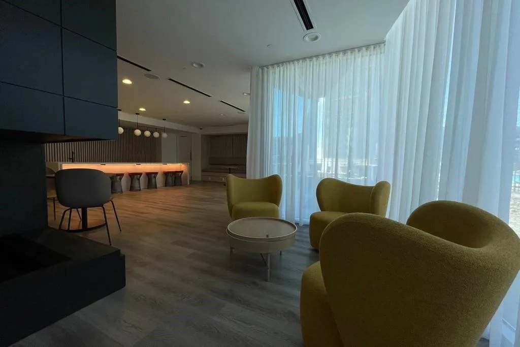 Community lobby featuring recessed lighting