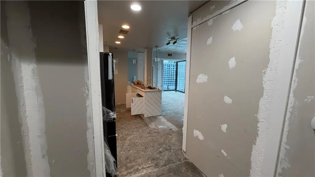 Hall featuring recessed lighting