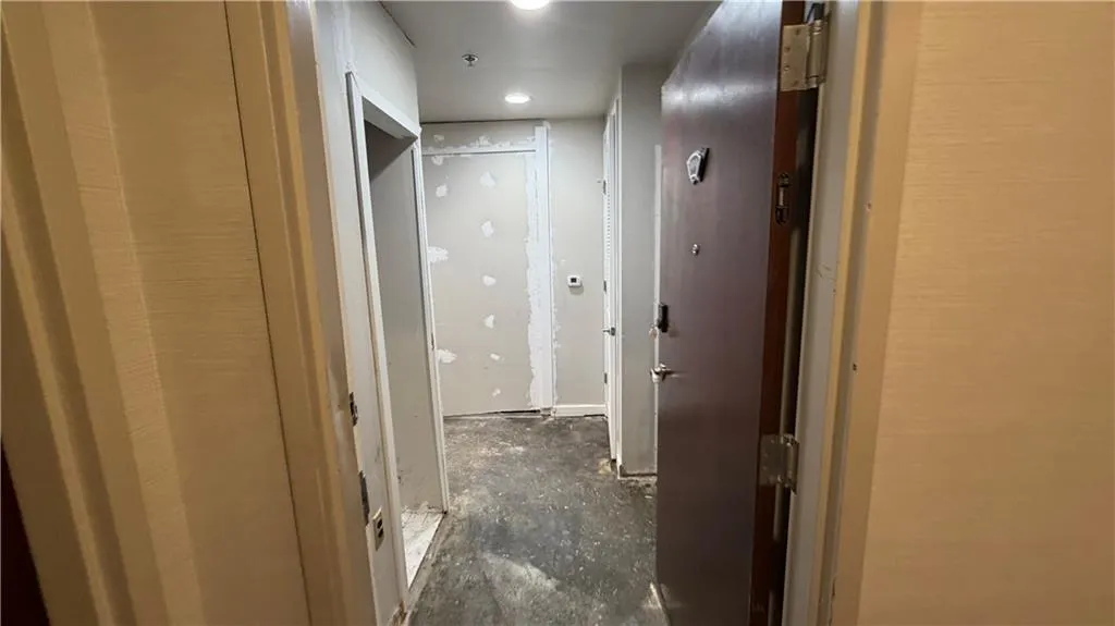 Hall featuring recessed lighting