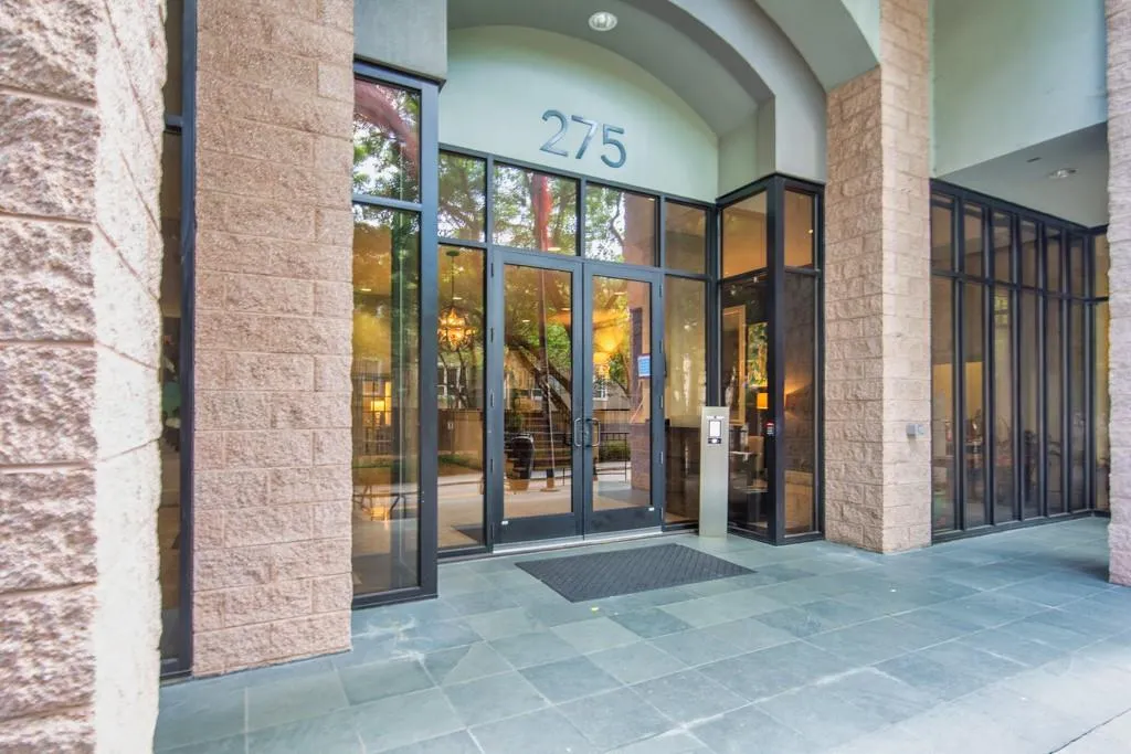 Property entrance featuring french doors