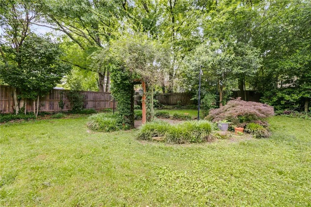View of fenced backyard