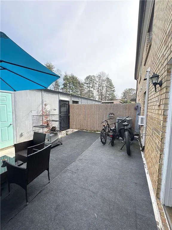 Fenced backyard featuring a patio area