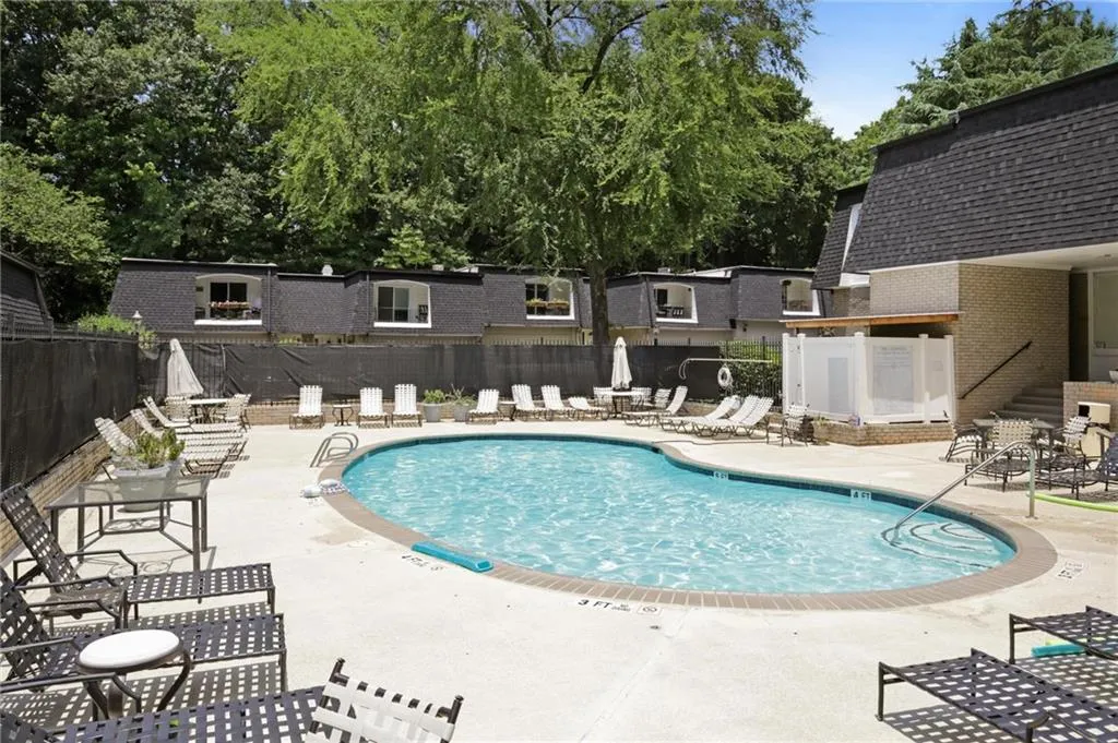 View of swimming pool with a patio