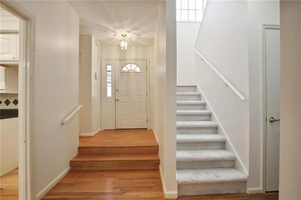 Foyer with light wood-type flooring