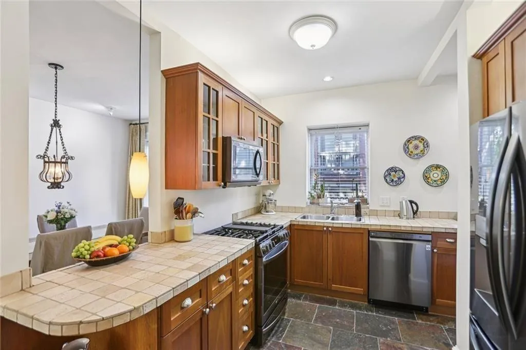 Opens to dining and living rooms