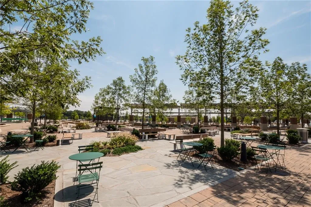 View of property's community featuring a patio area