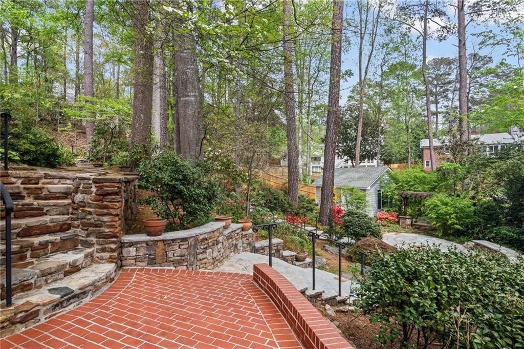 View of patio with view of wooded area