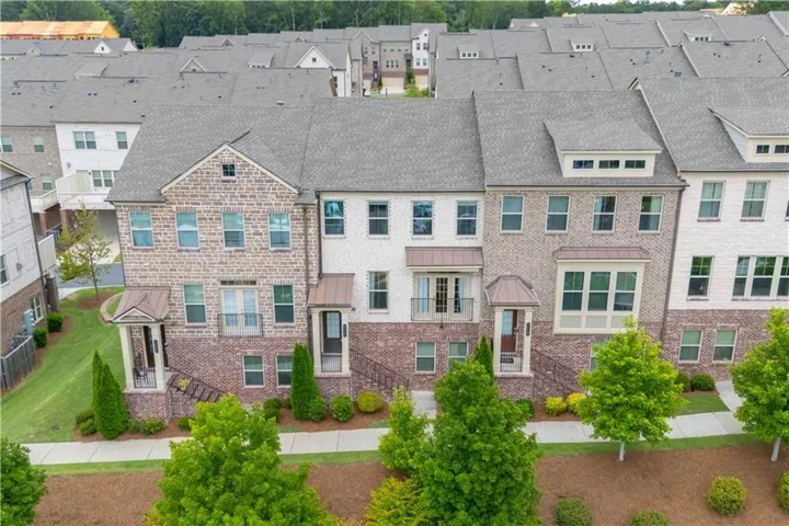 Brick and stone veneer exterior with gabled roof lines