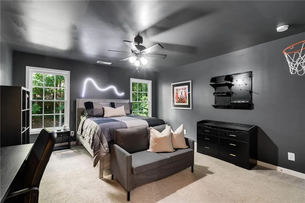 OVERSIZED SECONDARY BEDROOM | FRESH COLOR DRENCHED PAINT | VIEWS TO PRIVATE REAR YARD | STORAGE
