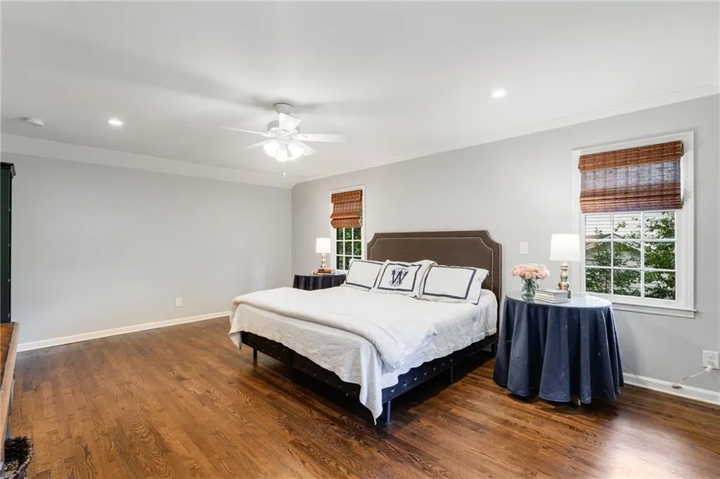 OVERSIZED PRIMARY BEDROOM | HARDWOOD FLOORS | NATURAL LIGHT | CUSTOM WINDOW TREATMENTS | RECESSED LIGHTING