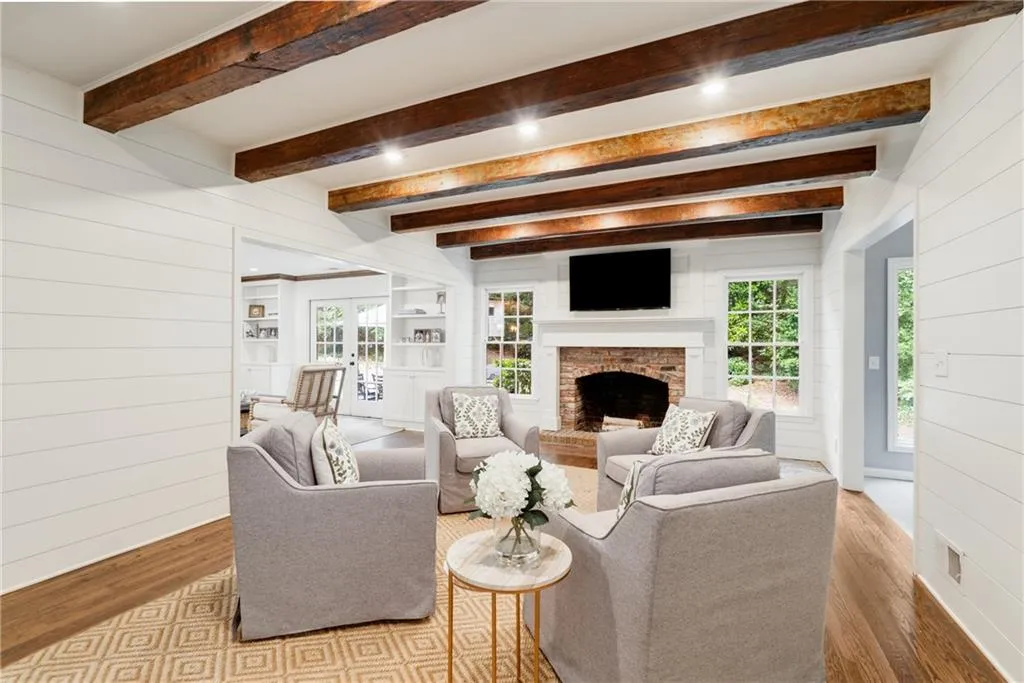 LIVING ROOM | RECLAIMED WOOD BEAMS | CUSTOM SHIPLAP | VIEWS TO KITCHEN + REAR YARD