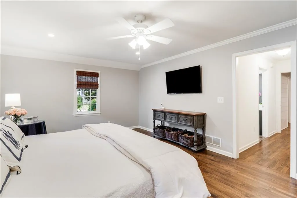 PRIMARY BEDROOM VIEW TO SPA BATH + CUSTOM WALK-IN CLOSET