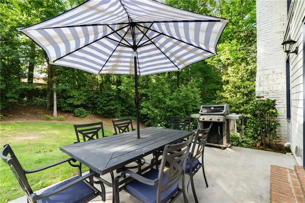 MAIN LEVEL GRILLING PATIO | VIEWS TO DEEP WOODED HOMESITE