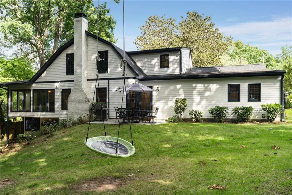 SWING INTO SUMMER | ENJOY LUSH LANDSCAPE WITH HYDRANGEA READY TO BLOOM | DEEP WOODED REAR YARD FOR LONG SUMMER NIGHTS OF LAUGHTER + JOY