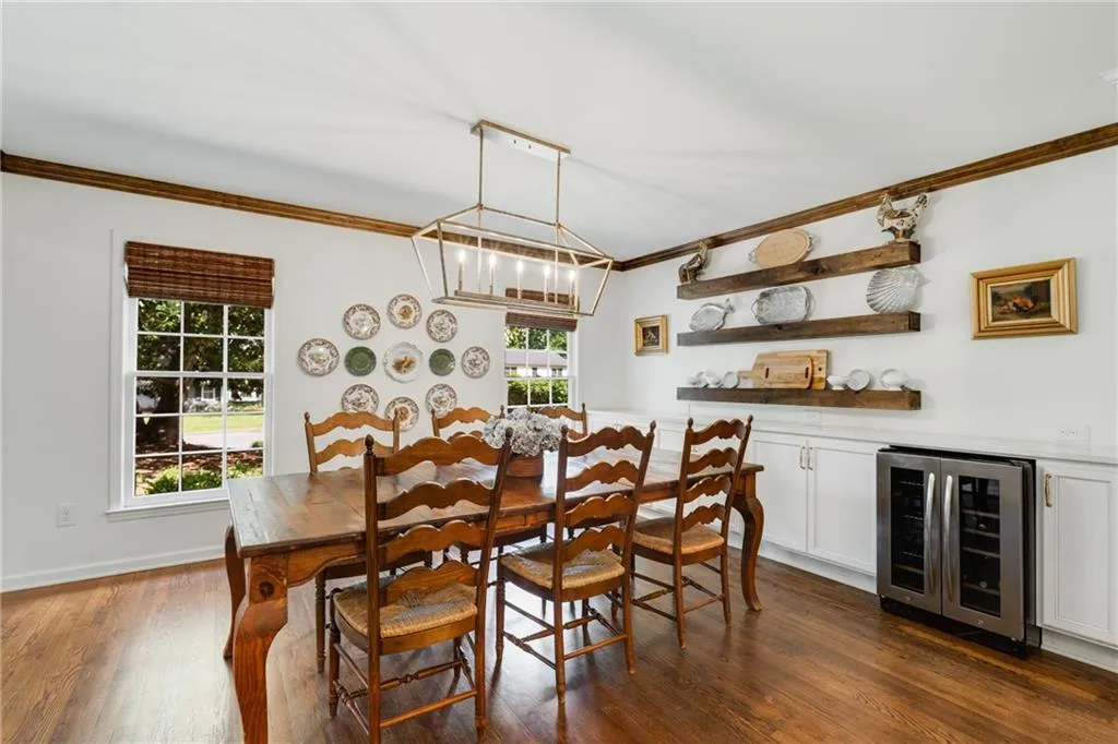 CUSTOM DINING ROOM STORAGE | BEVERAGE CENTER | BRIGHT NATURAL LIGHT | FLOATING WOOD SHELVING | CUSTOM CROWN MOLDING | CUSTOM WINDOW TREATMENTS