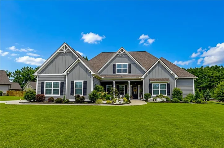 Craftsman-style exterior with gray siding and white trim