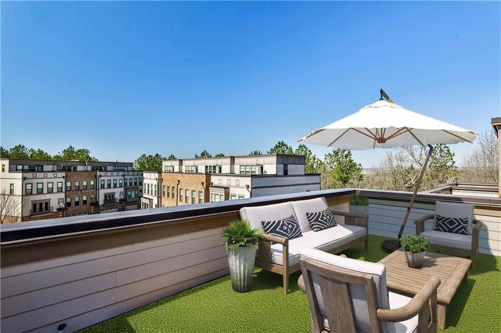 One of two rooftop patios. Virtually staged
