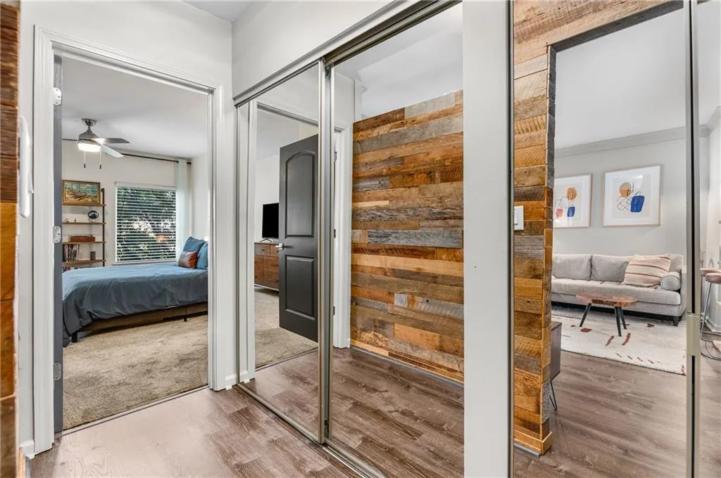 Hallway featuring wood finished floors