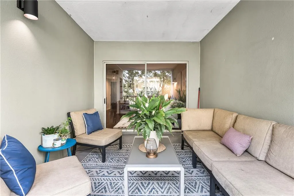 View of patio featuring an outdoor hangout area