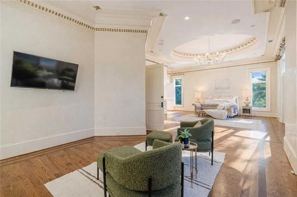 Building lobby featuring ornamental molding and recessed lighting