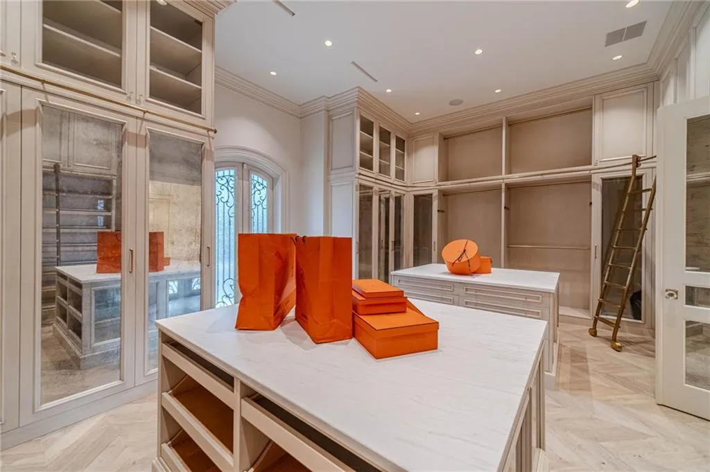 Walk in closet featuring french doors