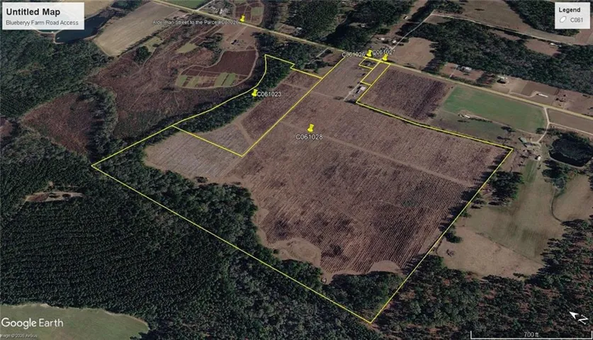 Aerial overview of property's location featuring property parcel outlined