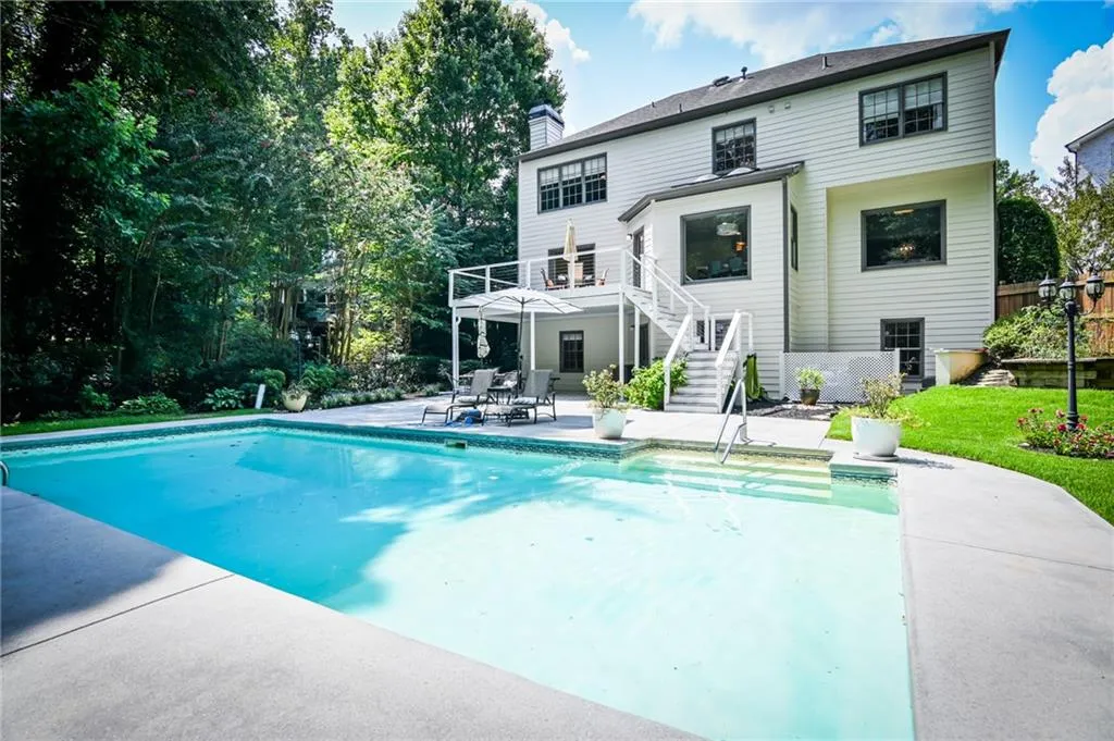 View of pool with a patio area