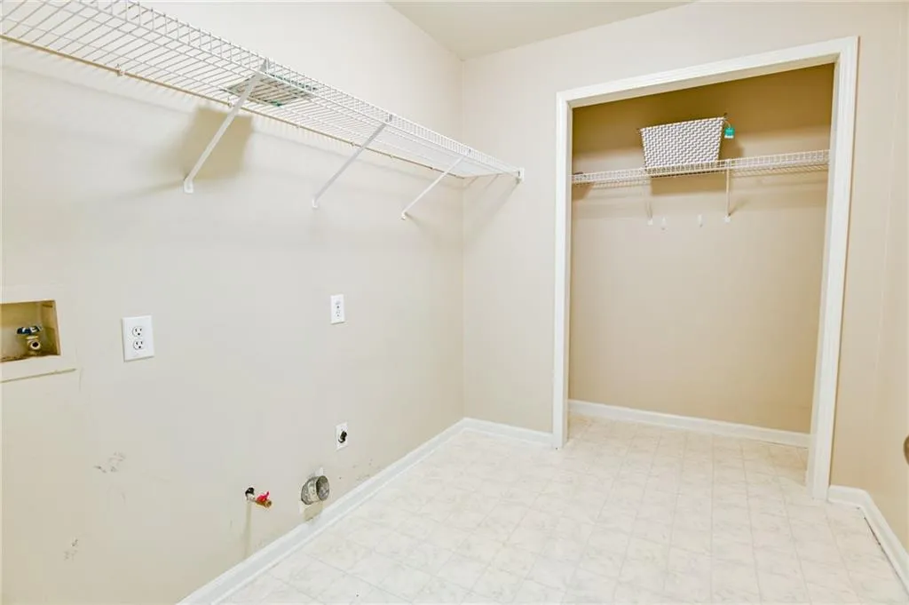 Washroom featuring hookup for a washing machine, gas dryer hookup, and hookup for an electric dryer