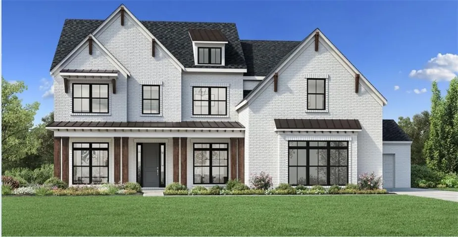 Two-story residence featuring a painted brick exterior, dark framed windows, and a shingled roof