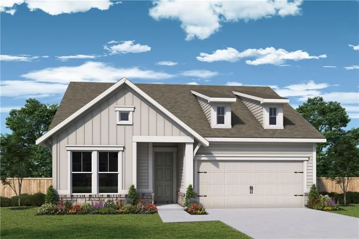 Contemporary single-story residence with vertical siding, dormer windows, attached garage, and a covered entry