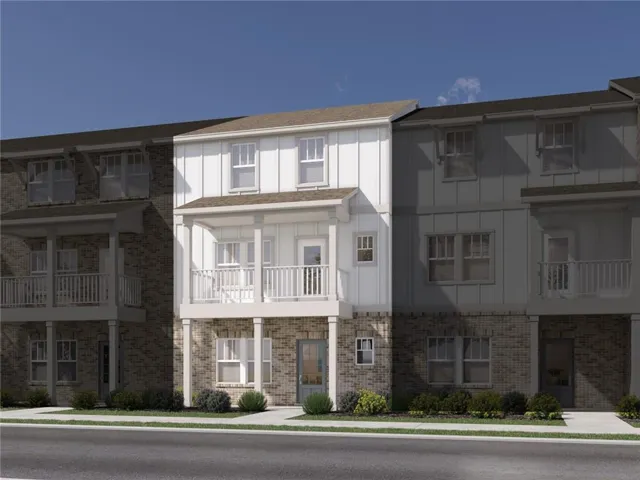 White vertical siding exterior with contrasting brick accents
