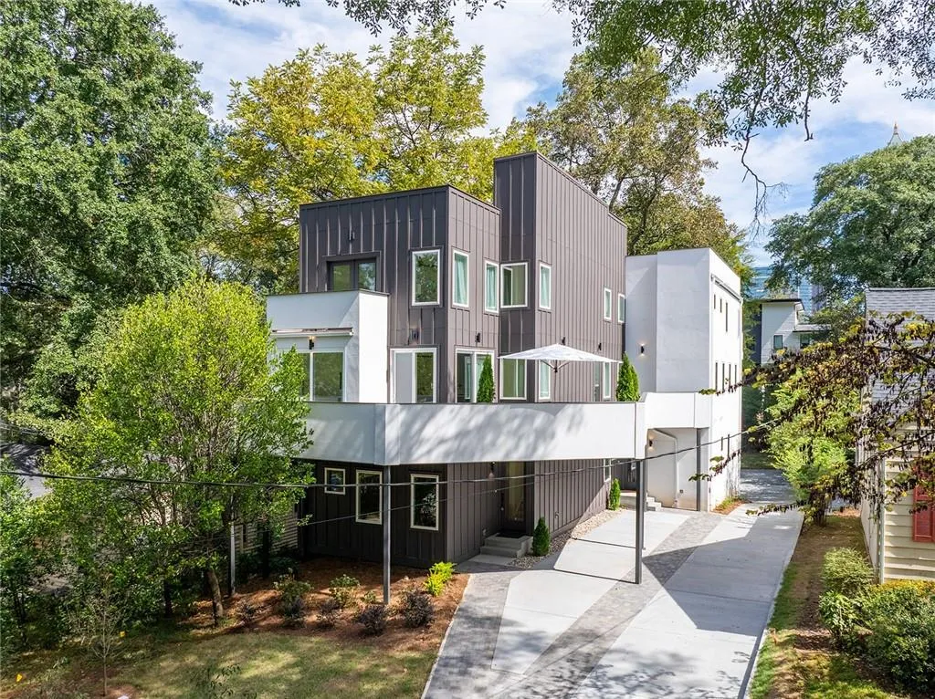 View of front facade with board and batten siding