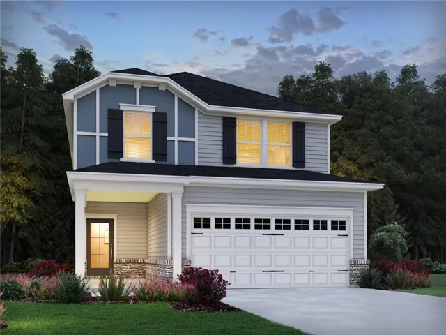 Two-story exterior with light blue siding accents, dark roof, front porch, attached garage, and mature landscaping