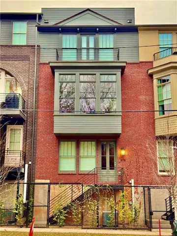 View of property with a fenced front yard