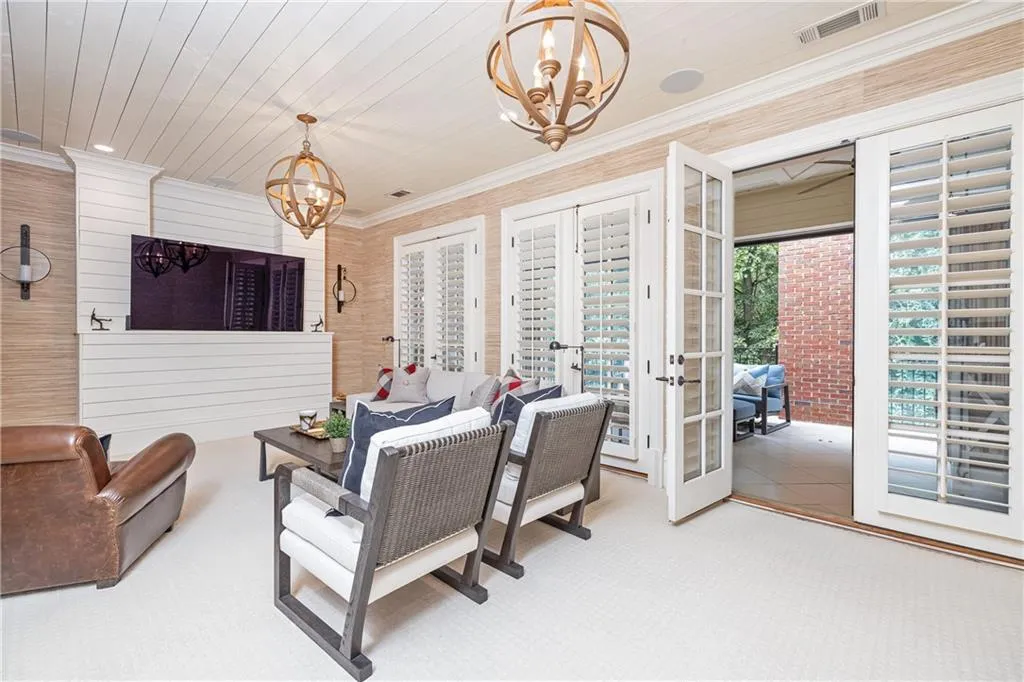 3 sets of double doors opening to balcony