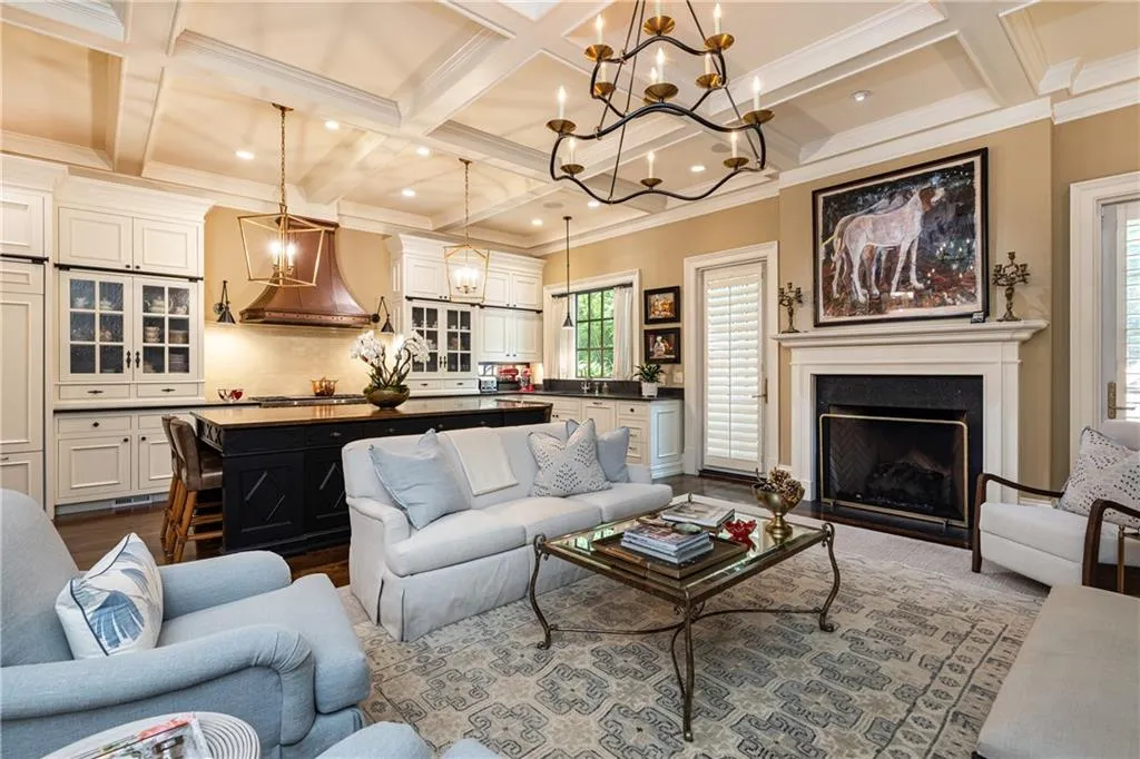 Den with fireplace and coffered ceiling