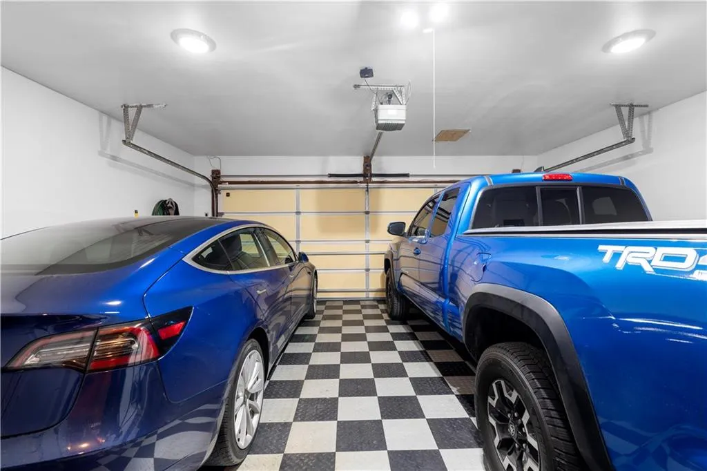 Two car garage with storage area