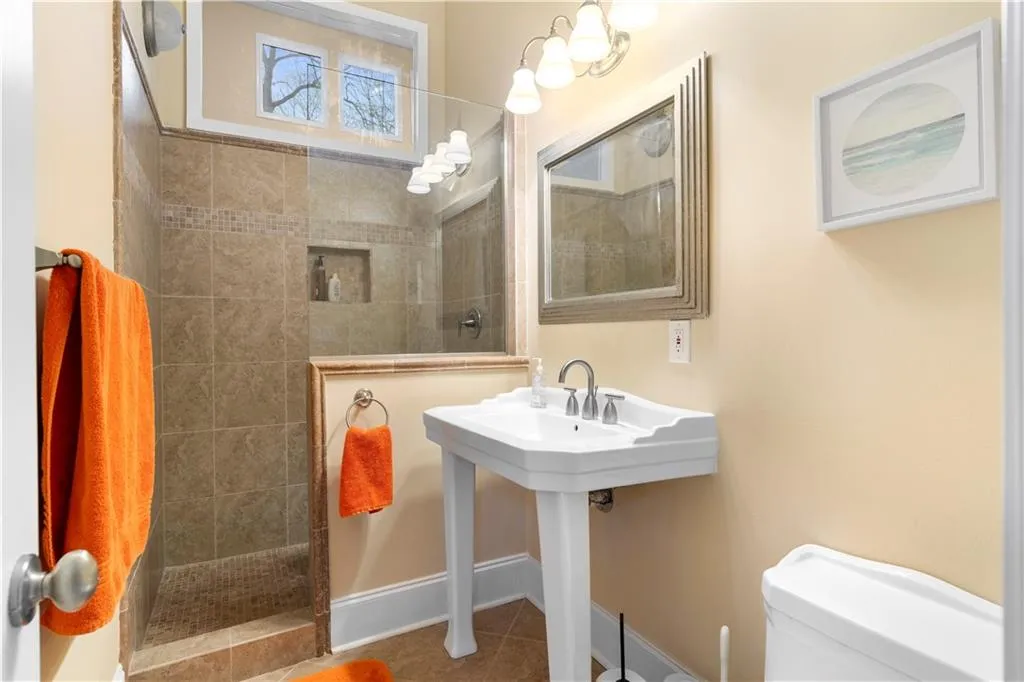 Third Full Bathroom on main level close to the pool access