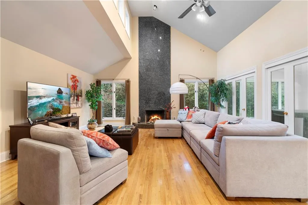 Spacious, light filled family room with fireplace