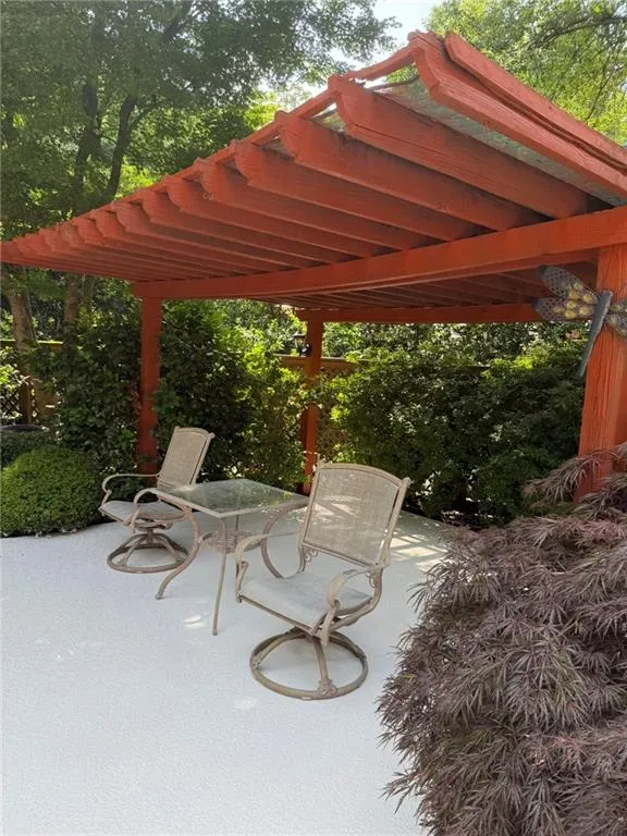 View of patio / terrace featuring outdoor dining area and a pergola