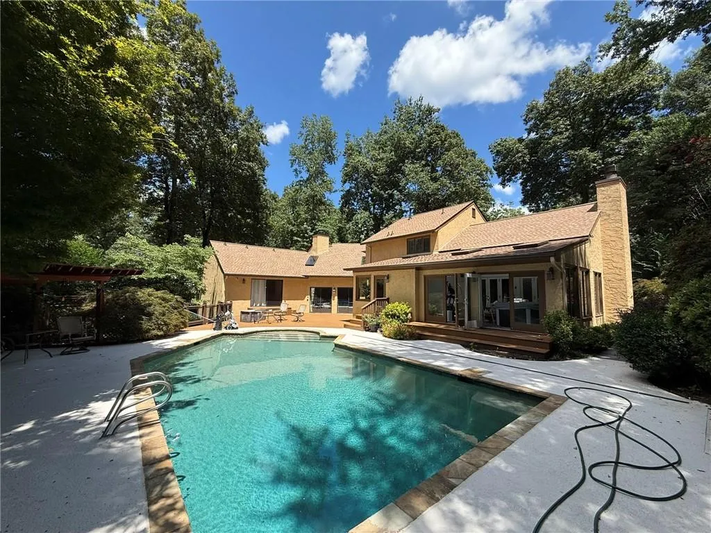 Swimming pool with a patio