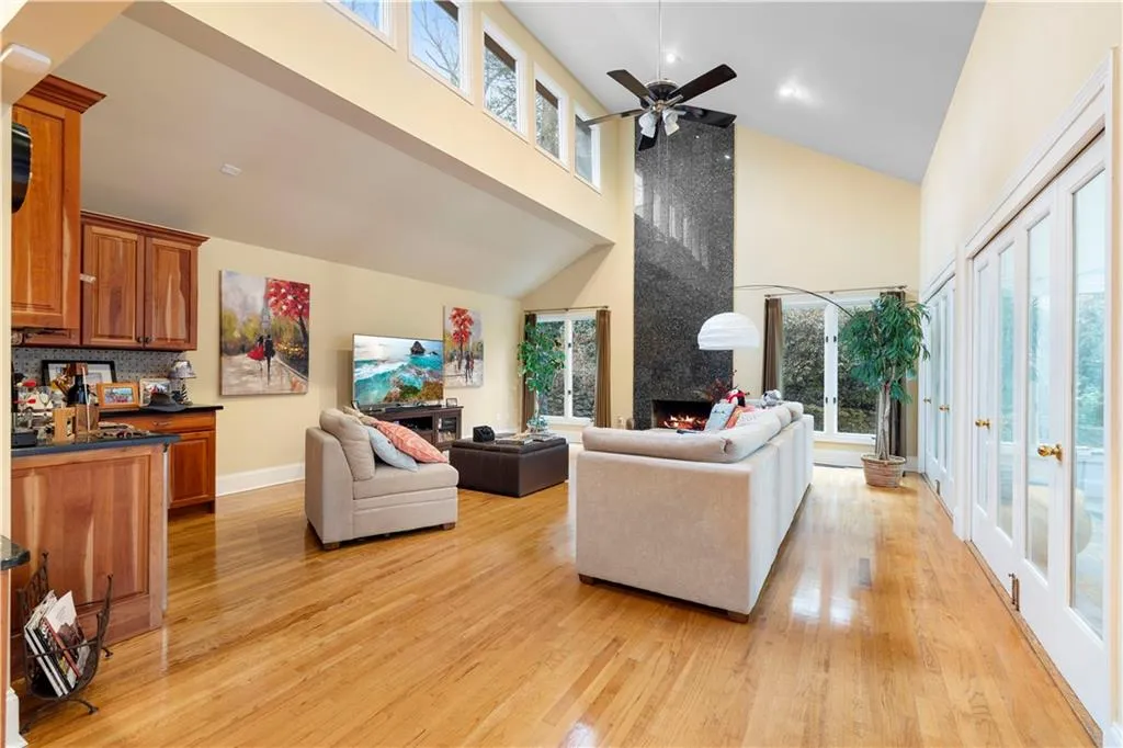 Spacious, light filled family room with fireplace