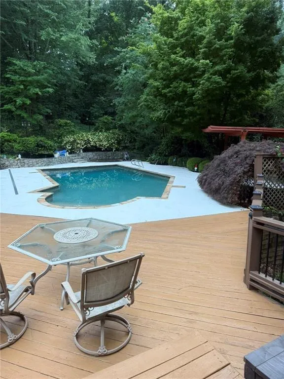 Swimming pool with a deck
