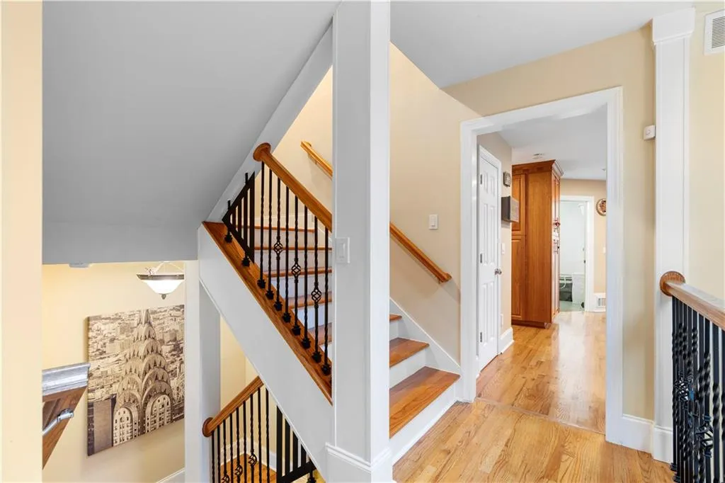 Staircase with wood finished floors