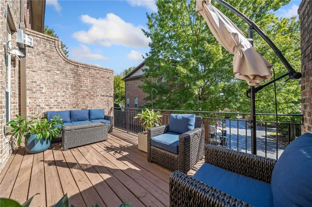 Wooden terrace with an outdoor hangout area