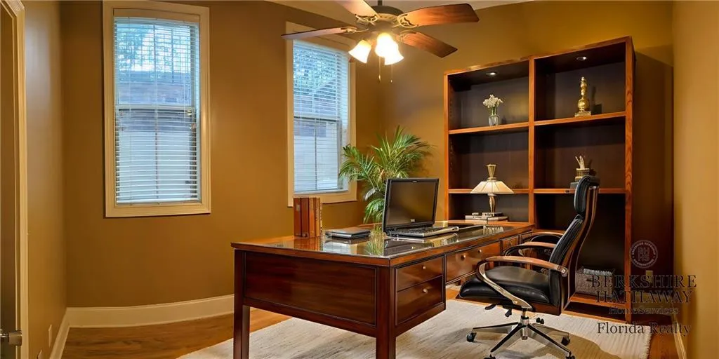 Virtually Staged Lower Bedroom turned Home office. What do you need?