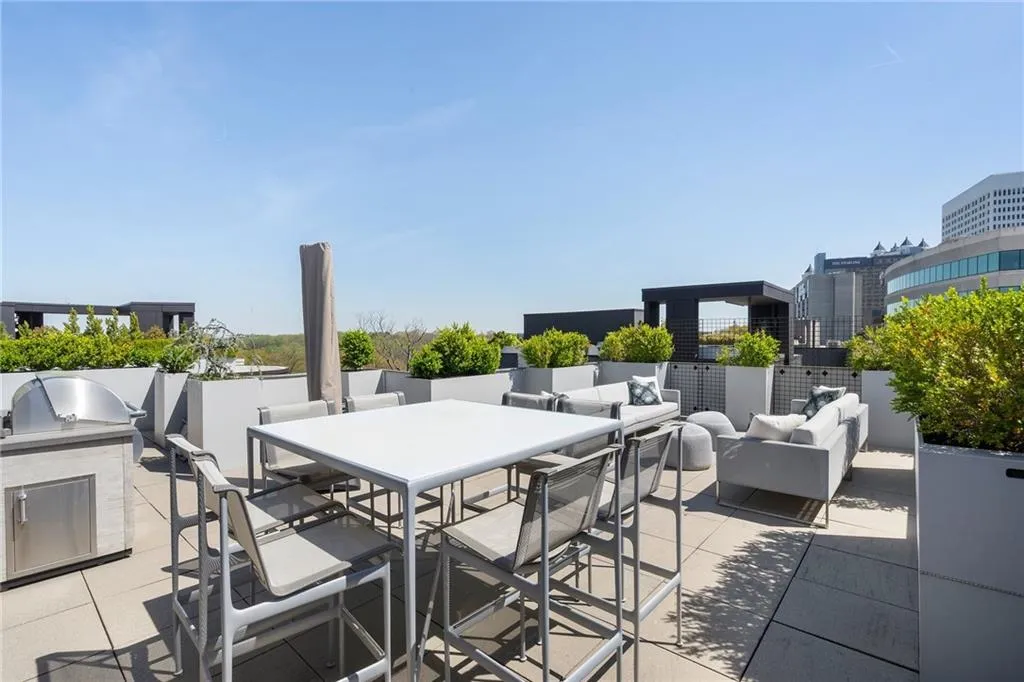 View of patio / terrace with an outdoor hangout area, outdoor dining area, and area for grilling