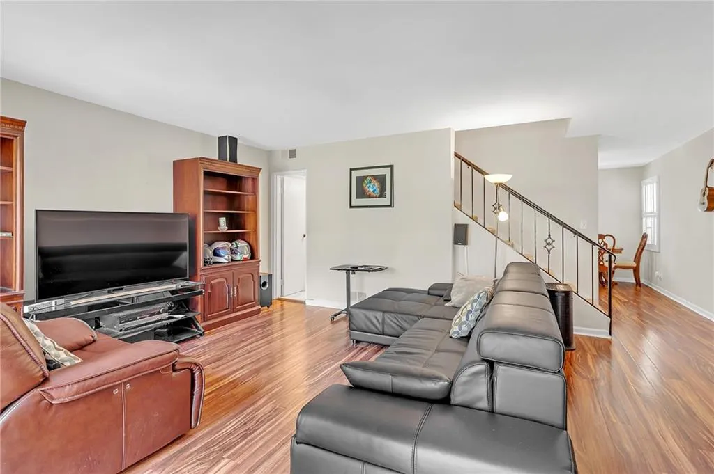 Living room featuring light wood-style flooring