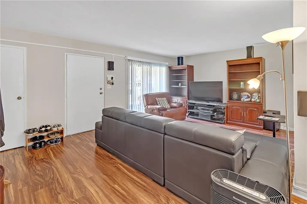 Living area featuring light wood finished floors