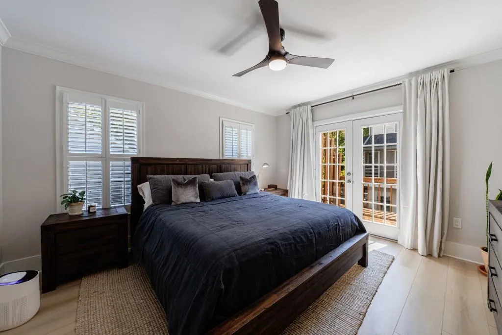 Primary Bedroom with French Doors leading to Deck